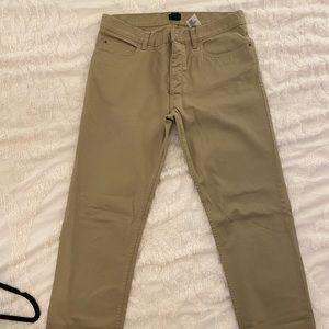 Never worn Men’s khaki slim jean